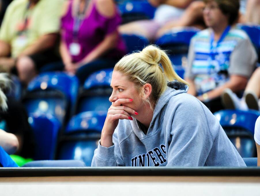 Lauren Jackson watches the Capitals from the sideline last Sunday. She could rejoin the action this weekend. Photo: Melissa Adams