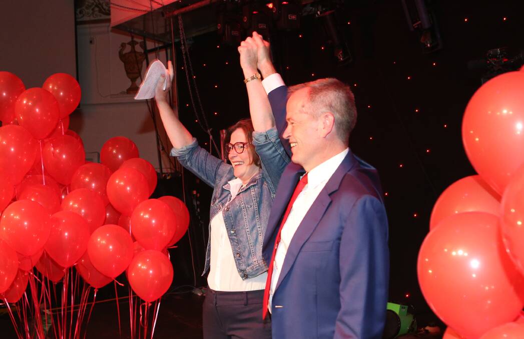 Ged Kearney and Bill Shorten claiming victory in Batman. Photo: AAP