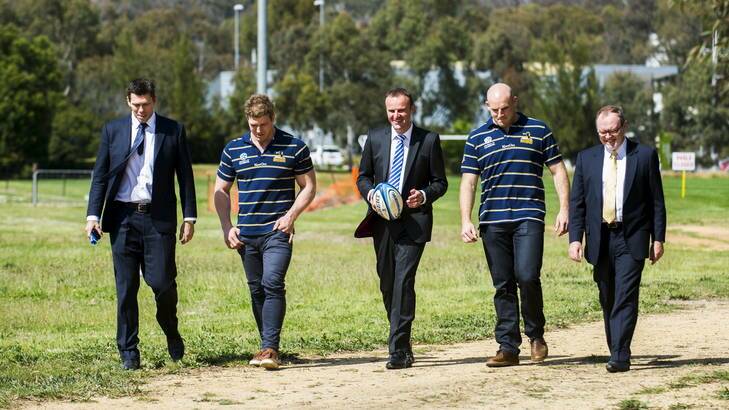 From left, Andrew Fagan, David Pocock, Andrew Barr, Stephen Moore, and Stephen Parker in front of the proposed new Brumbies HQ site at the University of Canberra. Photo: Rohan Thomson