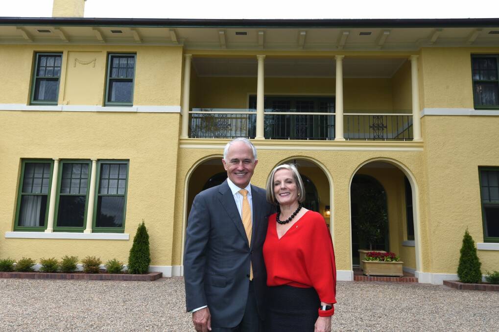 Prime Minister Malcolm Turnbull and wife Lucy Turnbull outside The Lodge. Photo: AAP
