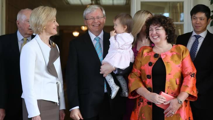 Prime Minister Kevin Rudd holding his granddaughter Joesphine with, left, the Governor-General Quentin Bryce and his wife Therese Rein after being sworn in as PM again. Photo: Andrew Meares
