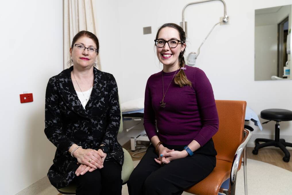 Endometriosis researcher Melissa Parker and patient Sophie Boyson. Photo: Lawrence Atkin