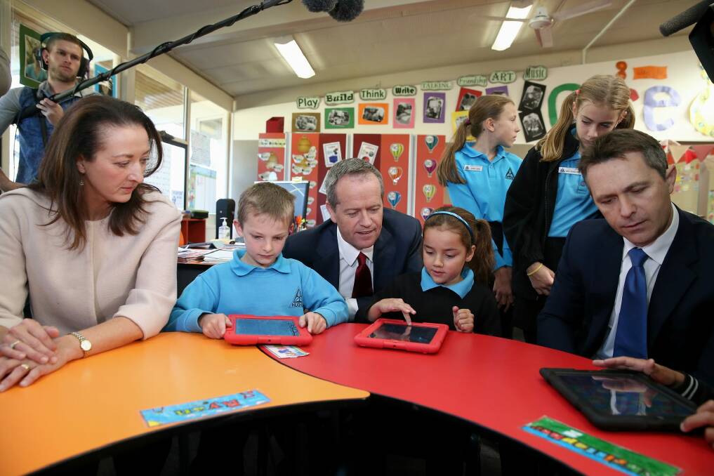 Labor MP Gai Brodtmann, Opposition Leader Bill Shorten and Shadow Communications Minister Jason Clare during their visit to Hughes Primary School in Canberra. Photo: Alex Ellinghausen