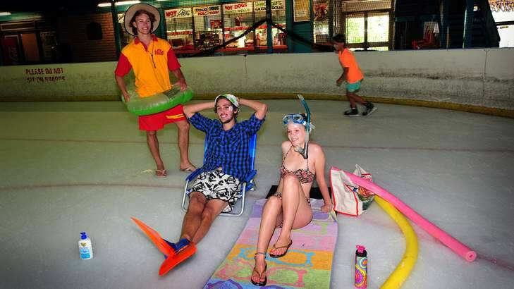 Cooling off at the Phillip skate rink during Canberra's hottest days are Woden swimming pool Lifeguard Rupert Denham, Alex Santiago, 19 of Jerrabomberra and Becky Bollen, 20 of Torrens. Photo: Karleen Minney