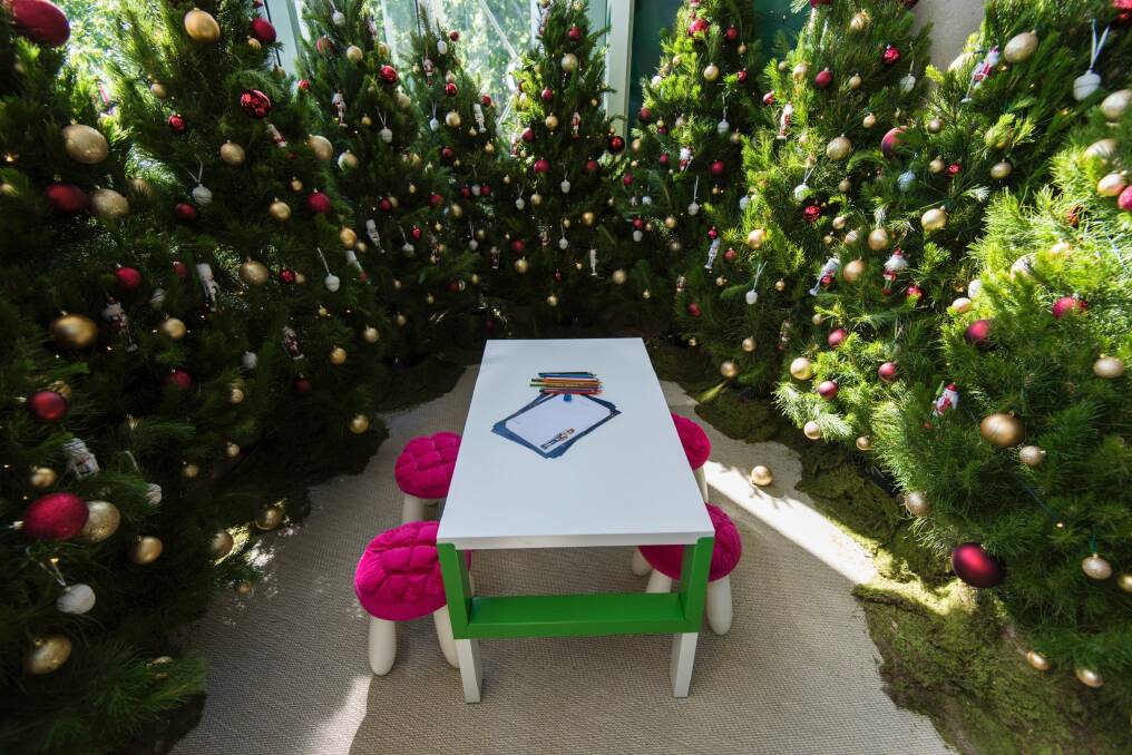 The Christmas maze at Canberra Centre, with secret nooks to write Santa a letter. Photo: Martin Ollmann