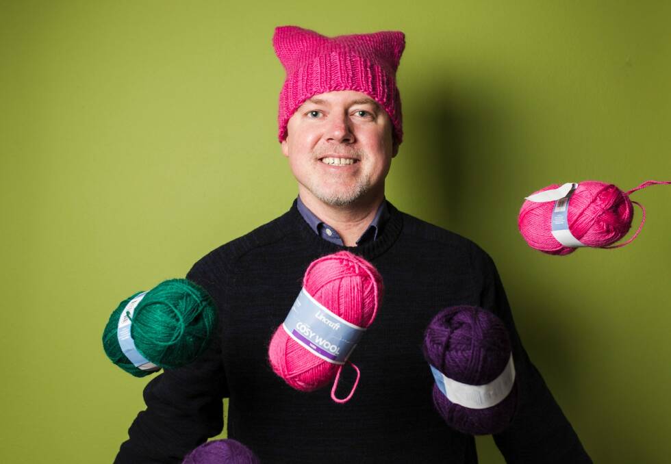 Stephen Lawton is leading a group of volunteers in knitting "pussyhats" to help raise money for frontline domestic violence services.  Photo: Jamila Toderas