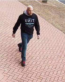 Police want to identify this man after a brawl they believe to be the result of tensions between bikie gangs. Photo: ACT Policing