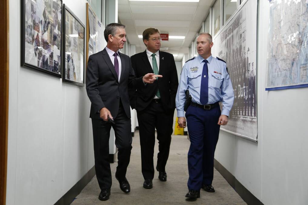 NSW Police Commissioner Andrew Scipione, NSW minister Troy Grant and Monaro Local Command superintendent Rod Smith at the Queanbeyan Police Station, which will get a $15-million makeover. Photo: Kim Pham