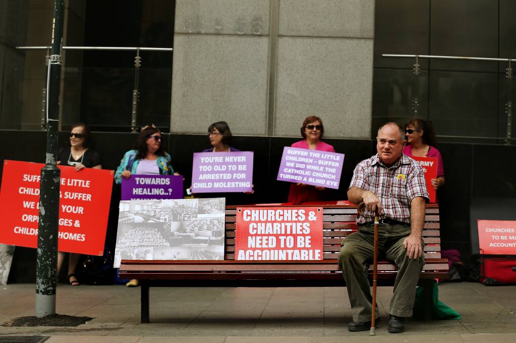Demonstrators outside the royal commission into child abuse hearings in 2013.  Photo: Kate Geraghty