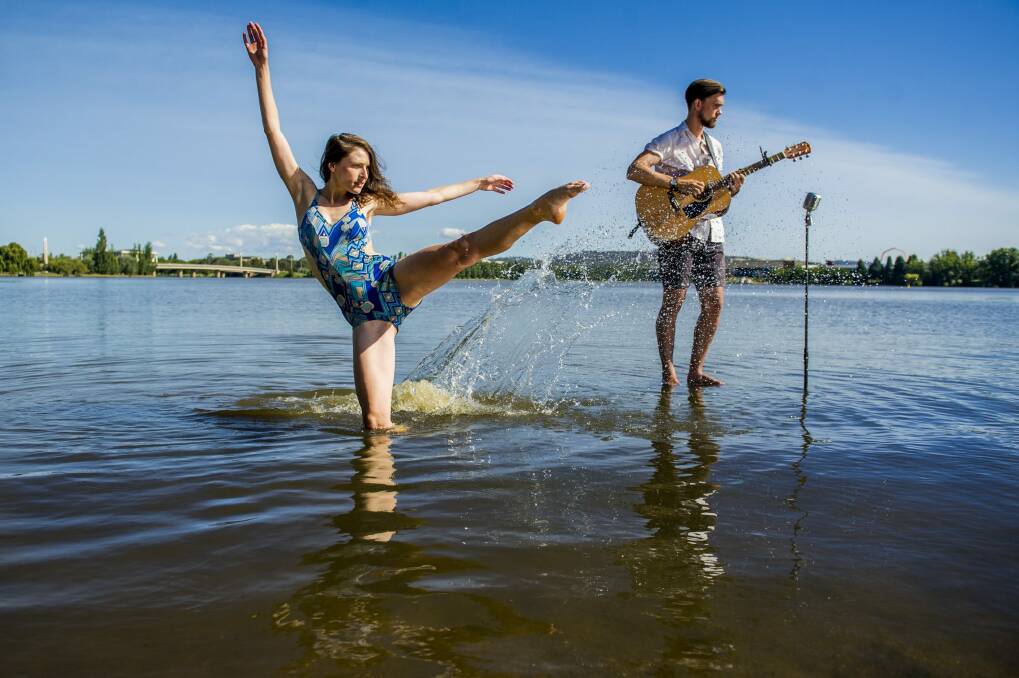 Dancer Alison Plevey and jazz violinist Liam Budge promote the Art, Not Apart beach party. Photo: Jay Cronan