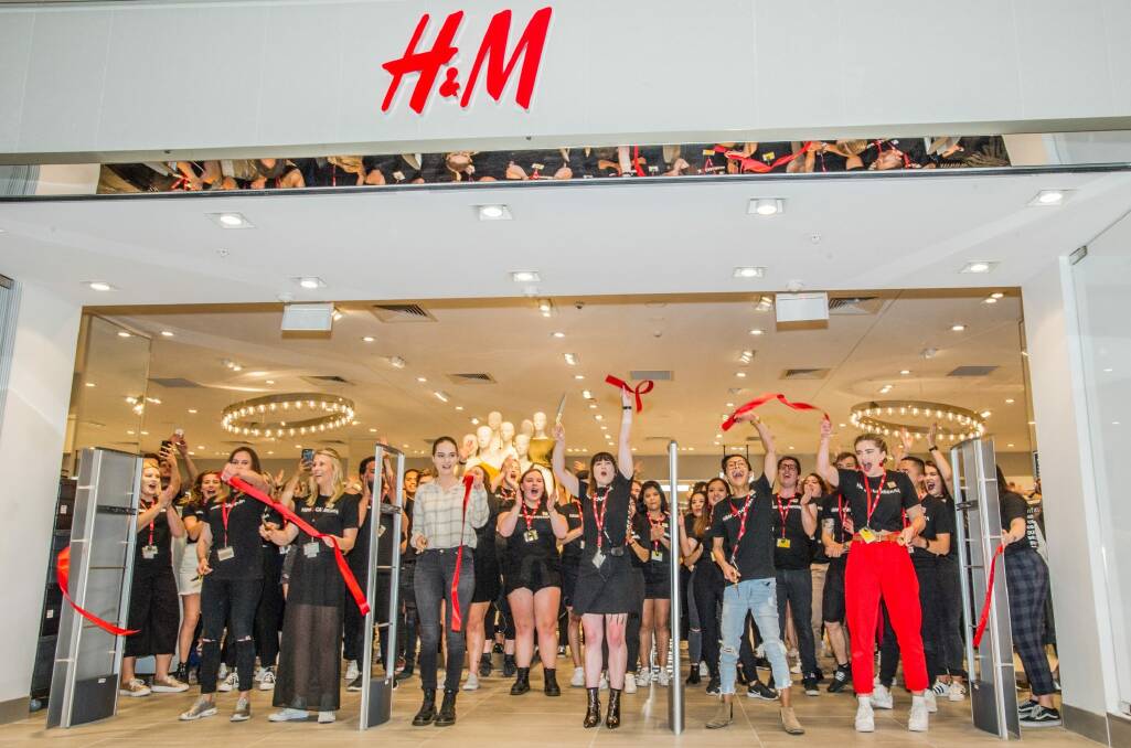 The ribbon is cut, officially opening Canberra's first H&M store at Canberra Centre. Photo: Karleen Minney