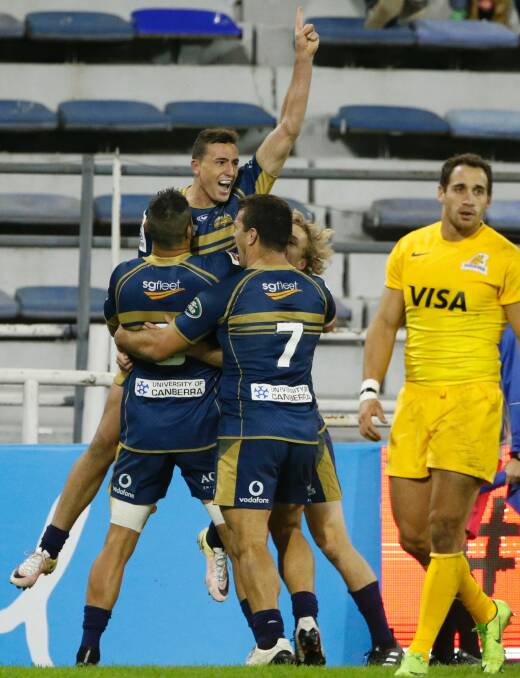 Thomas Banks of Brumbies celebrates with Chris Alcock after scoring a try during a match between Jaguares v Brumbies as part of Super Rugby Rd 14 at Jose Amalfitani Stadium on May 27, 2017 in Buenos Aires, Argentina. (Photo by Gabriel Rossi/LatinContent/Getty Images) Brumbies v Jaguares Photo: Gabriel Rossi/STF