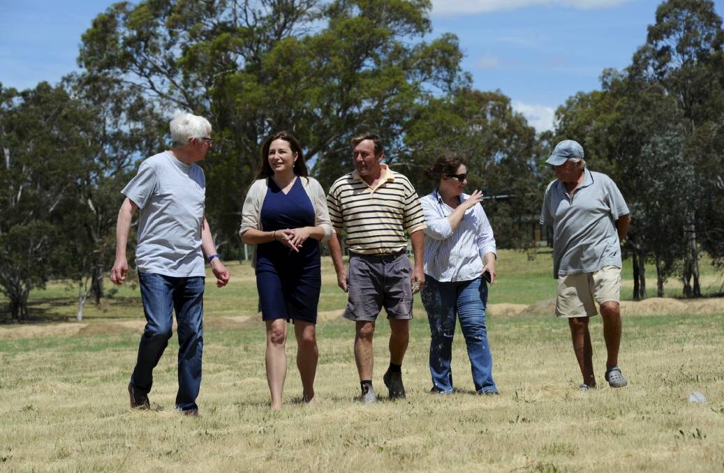 ACT Labor MLA, Yvette Berry, second from left, chats with
Higgins from left, Martin
Fitzpatrick, Geoff and Cathy McIlhoney and Gerhard Schneider. Photo: Graham Tidy