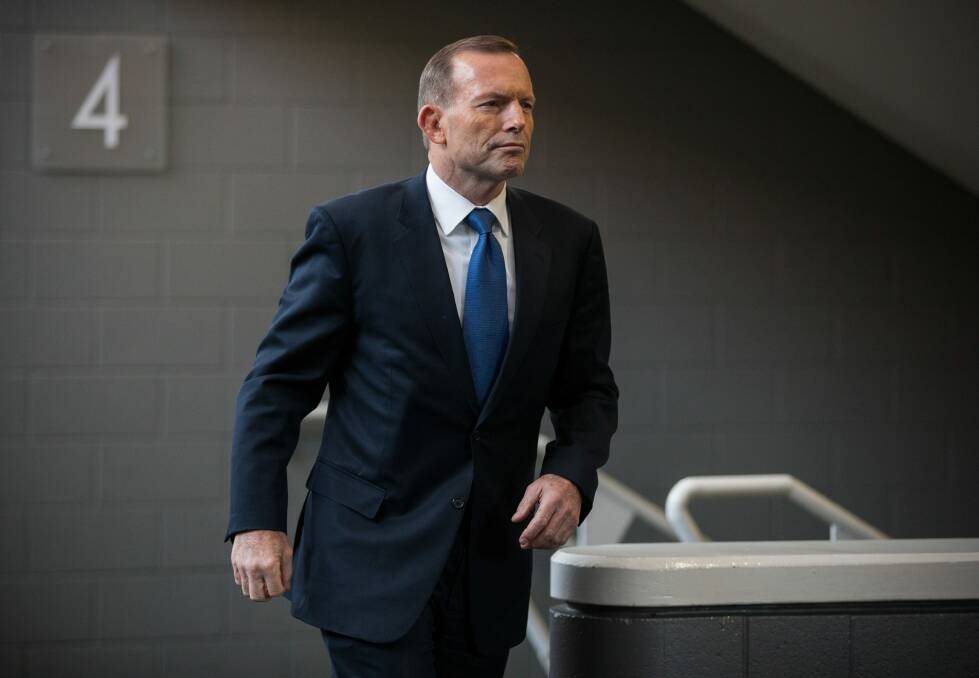 Prime Minister Tony Abbott in South Australia, where he's expected to make an announcement for a military building program on Tuesday.  Photo: AAP