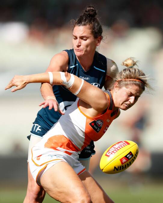 In the blood: Ellie Brush looks like she's been playing footy for years. Photo: Getty Images