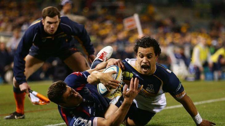 Matt Toomua scores for the Brumbies in Saturday night's win over the Melbourne Rebels. Photo: Getty Images