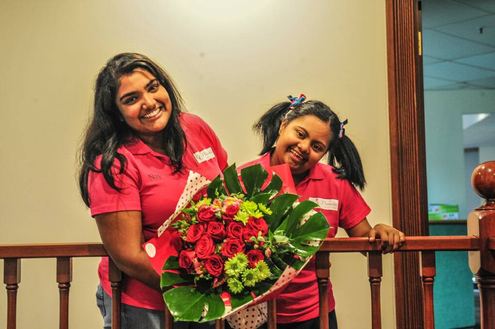 Nip Wijewickrema and her sister Gayana of GG's Flowers have expanded into hampers for distribution Australia-wide. Photo: Karleen Minney