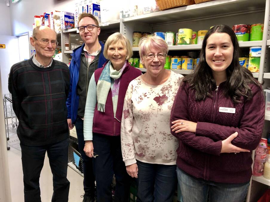 Some of the team behind St John's Care in Reid: volunteer Neil Smail, programs manager Jason Haines and volunteers Rosemary Thwaites, Joyce Holmes and Leona Behrendt. Photo: Supplied