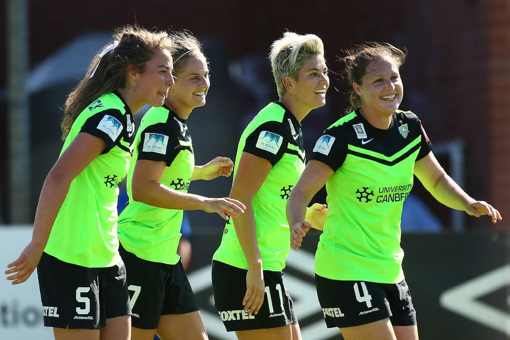 Jenna McCormick, Ellie Brush, Michelle Heyman and Kendall Fletcher of Canberra celebrate after a goal. Photo: Paul Kane