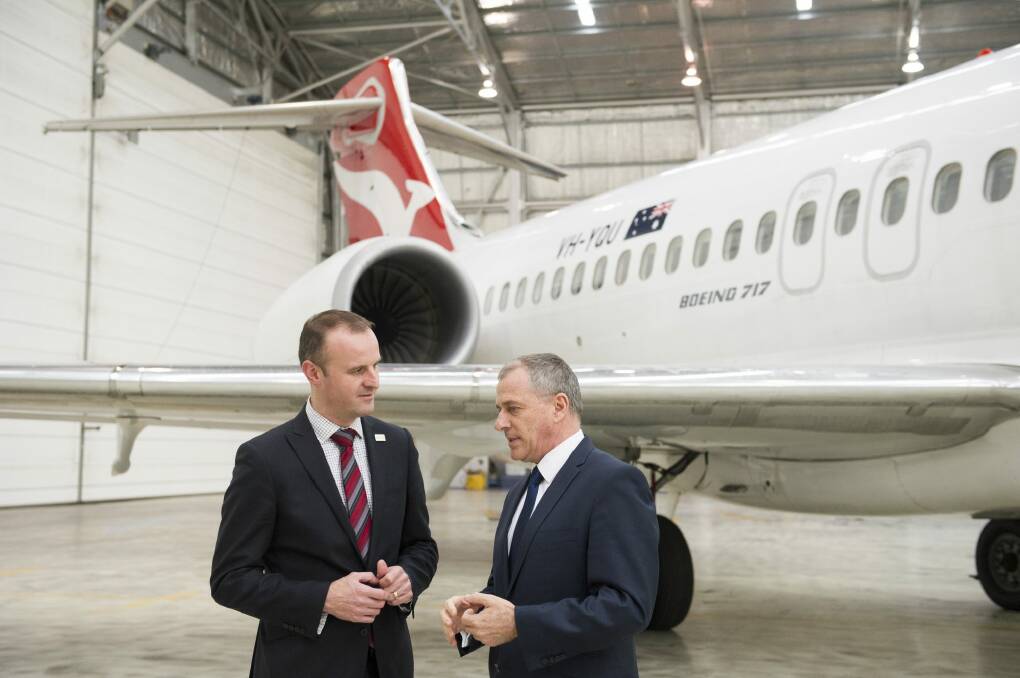 QantasLink CEO John Gissing and ACT Chief Minister Andrew Bar with a Boeing 717. Photo: Jay Cronan