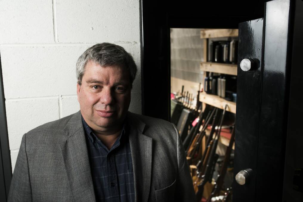 Managing director of shooters.com.au, Bruce Brown, outside the safe at their Mitchell shopfront.  Photo: Rohan Thomson