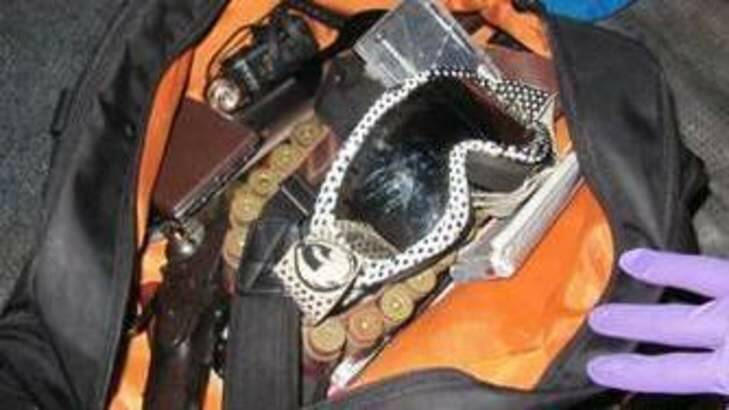 Gun and ammunition seized from stolen van in Tuggeranong. Photo: Supplied