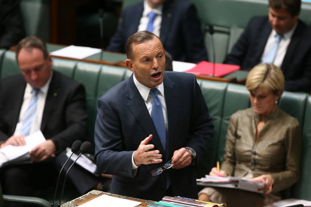 Tony Abbott: "There should be no difference in how we treat Australians who join a hostile army and those engaged in terrorism." Photo: Andrew Meares