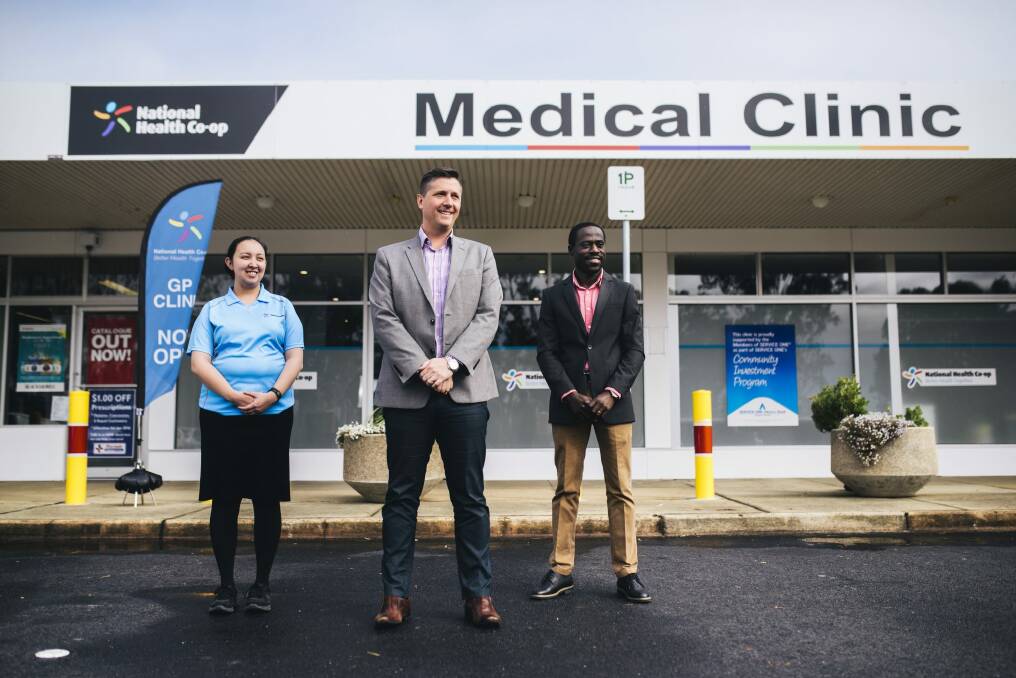Nurse Kieth Ancheta, 
director Adrian Watts and medical director Joe Oguns outside the National Health Co-op medical clinic in Macquarie. 
 Photo: Rohan Thomson
