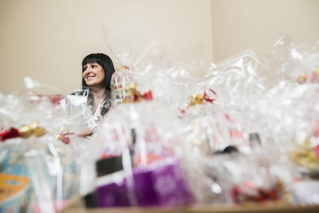 Natasha Tziarkas with some of the packages she has put together for women in crisis.  Photo: Rohan Thomson