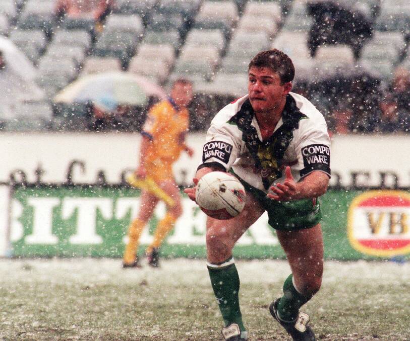 Simon Woolford playing in the memorable Raiders snow game in May, 2000. Both Chris and Phil reckon it's the game that sticks in their memory most.
 Photo: Matthew Strand