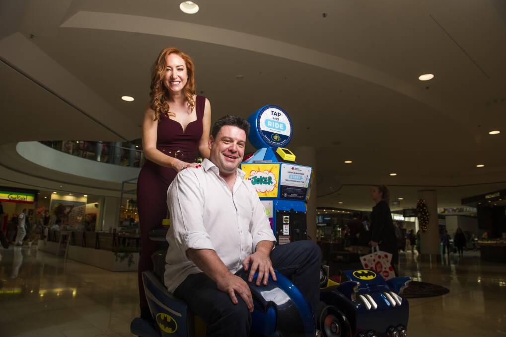 Kristen Henry and Nigel Johnson at Westfield Belconnen on Thursday. Johnson said he had missed the fun and spontaneity of radio. Photo: Dion Georgopoulos