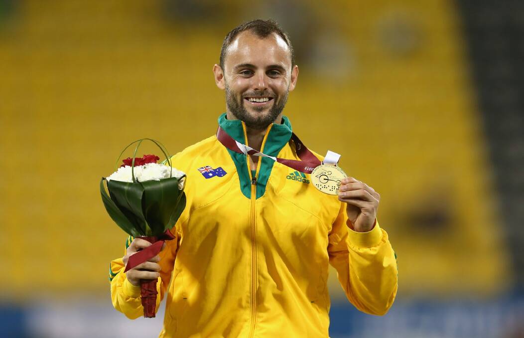 Reardon with his World Championships gold medal in Doha.  Photo: Francois Nel