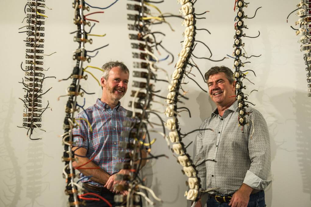 Professor Greg Stuart and artist Martin Rowney with Neural Nexus.  Photo: Karleen Minney