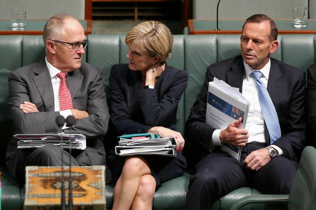 Communications Minister Malcolm Turnbull, Foreign Affairs Minister Julie Bishop and Prime Minister Tony Abbott later in question time. Photo: Alex Ellinghausen