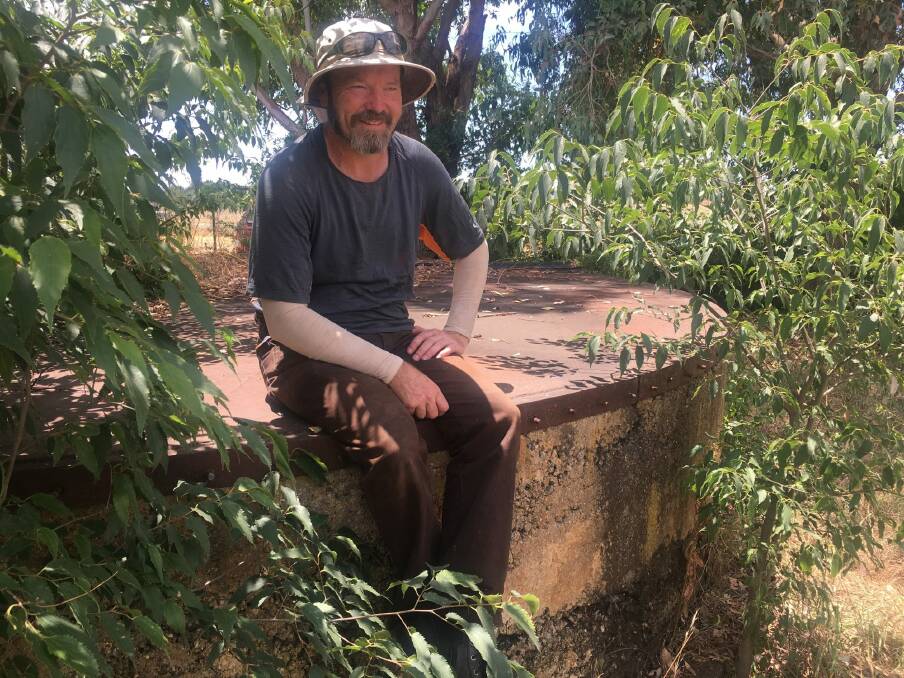 Global Worming managing director Cid Riley on the old tank near the Jerrabomberra Wetlands.  Photo: Tim the Yowie Man