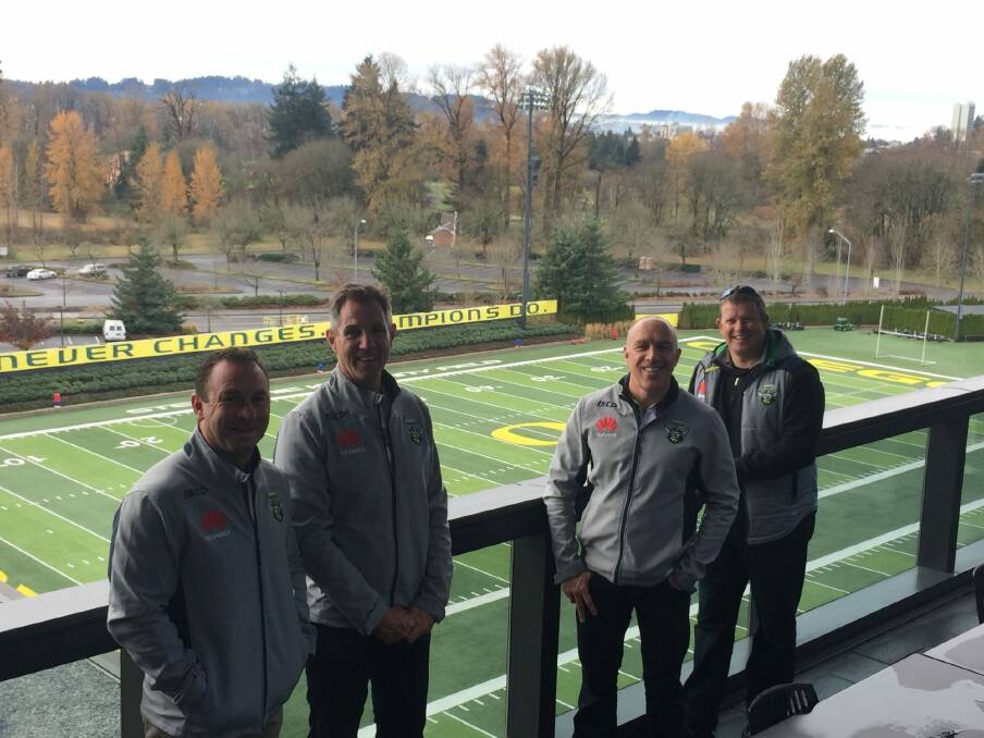 Canberra Raiders coach Ricky Stuart, chief executive Don Furner, football manager John Bonasera and commercial and marketing manager Jason Mathie at the Oregon Ducks' outdoor training field.
