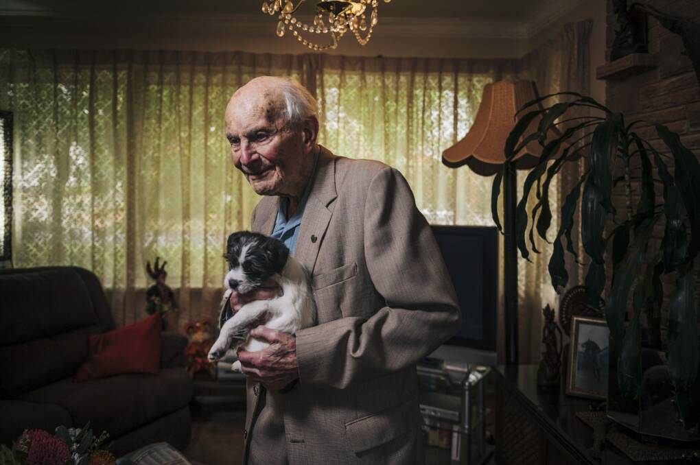Victor Lederer, pictured with his puppy Buddy, says attitude is key to enjoying advanced age. Photo: Rohan Thomson