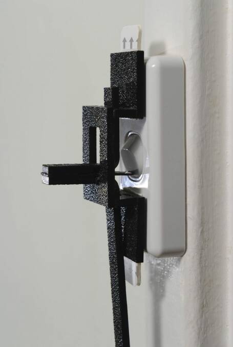 Their light switch adapter has been launched on Kickstarter. Photo: Graham Tidy