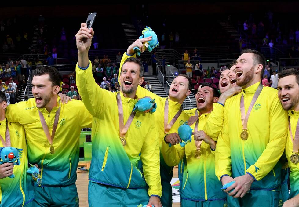 Gold medal winners: the Boomers celebrate. Photo: AAP