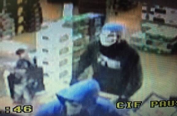 The two offenders were caught on camera at the Belconnen Bottle-O store. Photo: ACT Policing