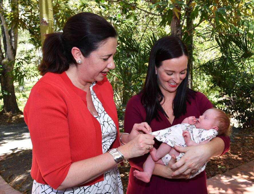 Queensland Premier Annastacia Palaszczuk with member for Keppel Brittany Lauga (right) and her new born baby girl, Odette, on the campaign trail,  Photo: AAP