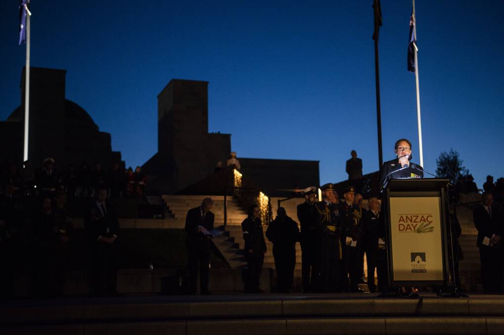 Retired Colonel Susan Neuhaus delivers the dawn service address during the Anzac Day dawn service at the Australian War Memorial in Canberra. Photo: Rohan Thomson