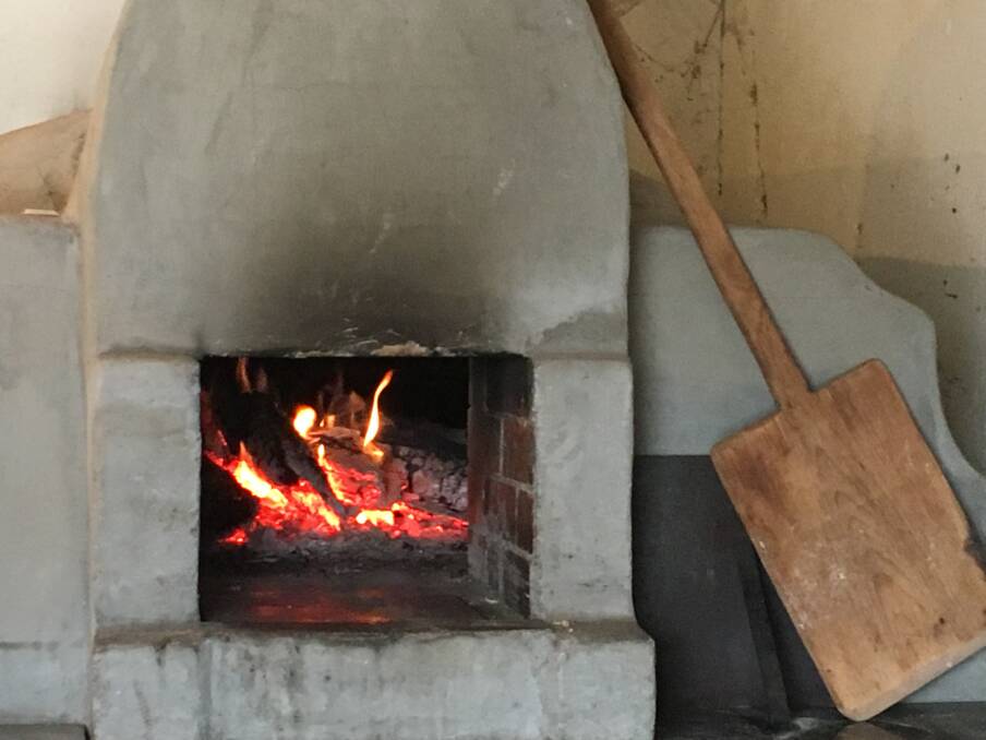 Wood-fired oven used to bake bread and pizza in the  afterheat in the Ben Hall  Cottage at the rear of The  Sir  George in Jugiong. Photo: Tim The Yowie Man