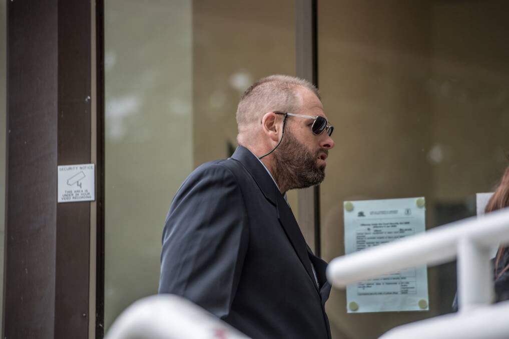 Truck driver Darren Sansom arrives Queanbeyan court charged after cyclist killed on the Federal highway on the NSW-ACT border. Photo: Karleen Minney