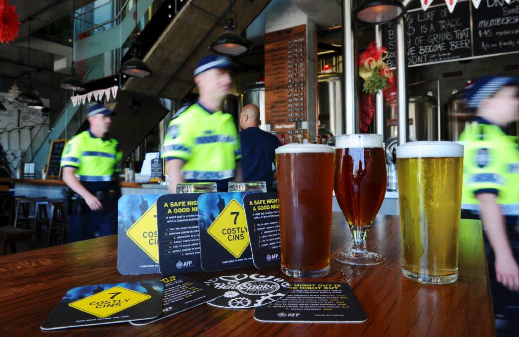 Members of ACT Policing's regional targeting team will monitor Canberra's growing number of licensed venues during the summer drinking season.  Photo: Graham Tidy