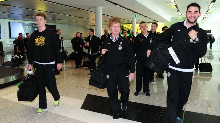 Tuggeranong United players arrive back at Canberra Airport on Wednesday afternoon. Photo: Melissa Adams