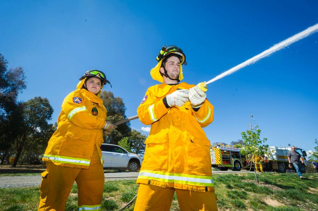 Firefighters Molly McDonnell and Nicholas Swan are ready for the fire season.  Photo: Dion Georgopoulos