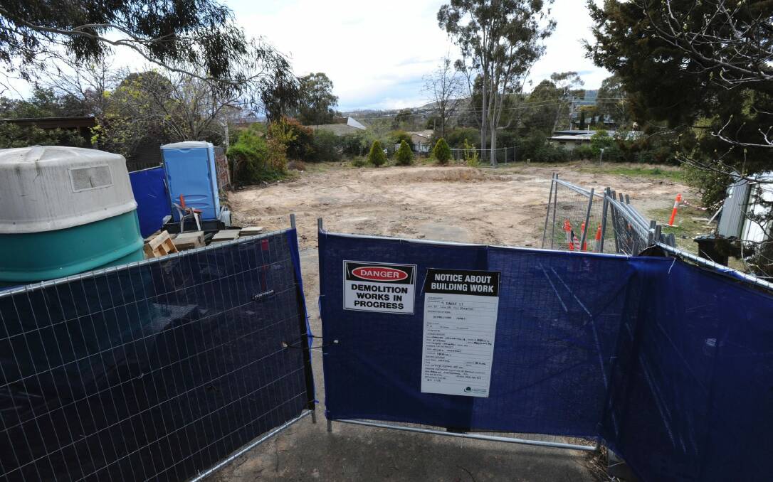 The empty block of land at Darke Street in Torrens where the Mr Fluffy home was demolished.  Photo: Graham Tidy