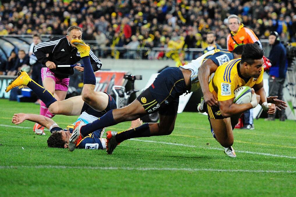 Speed bump: Julian Savea scores during the Super Rugby Semi Final match between the Hurricanes and the Brumbies. Photo: Mark Tantrum