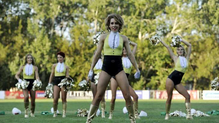 Members of the Raiderettes say the Raiders should not have hired a professional dance troupe such as the Rogue Dolls. Photo: Jay Cronan